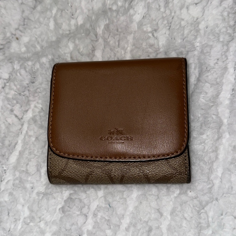 Coach signature brown / tan coated canvas and leather wallet damaged